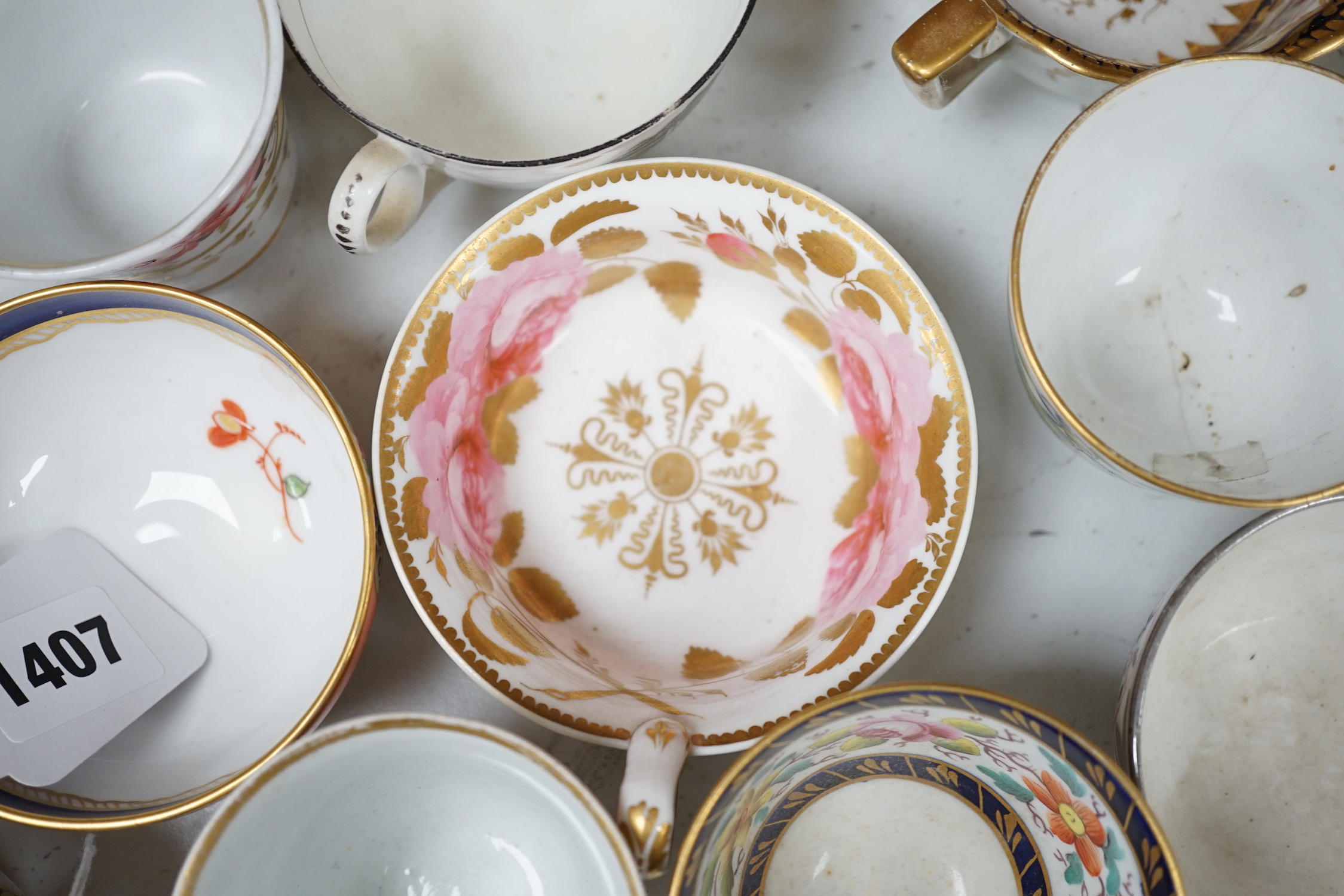 A group of Regency and Victorian porcelain tea, coffee cups and saucers, Newhall, Chamberlains, Coalport, etc.
